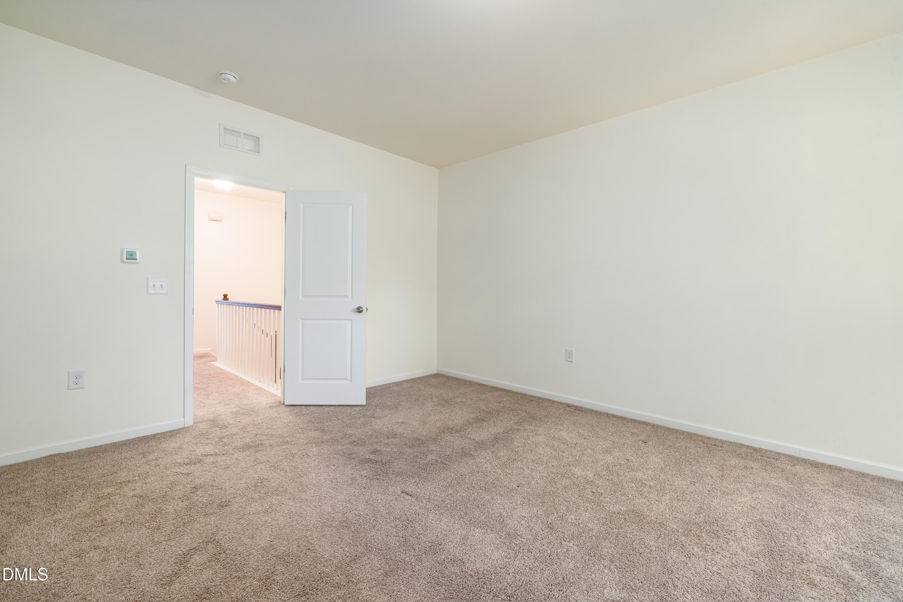 4351 Flintlock Lane Durham, NC 27704 - Photo 22 of 29 an empty room with an entryway