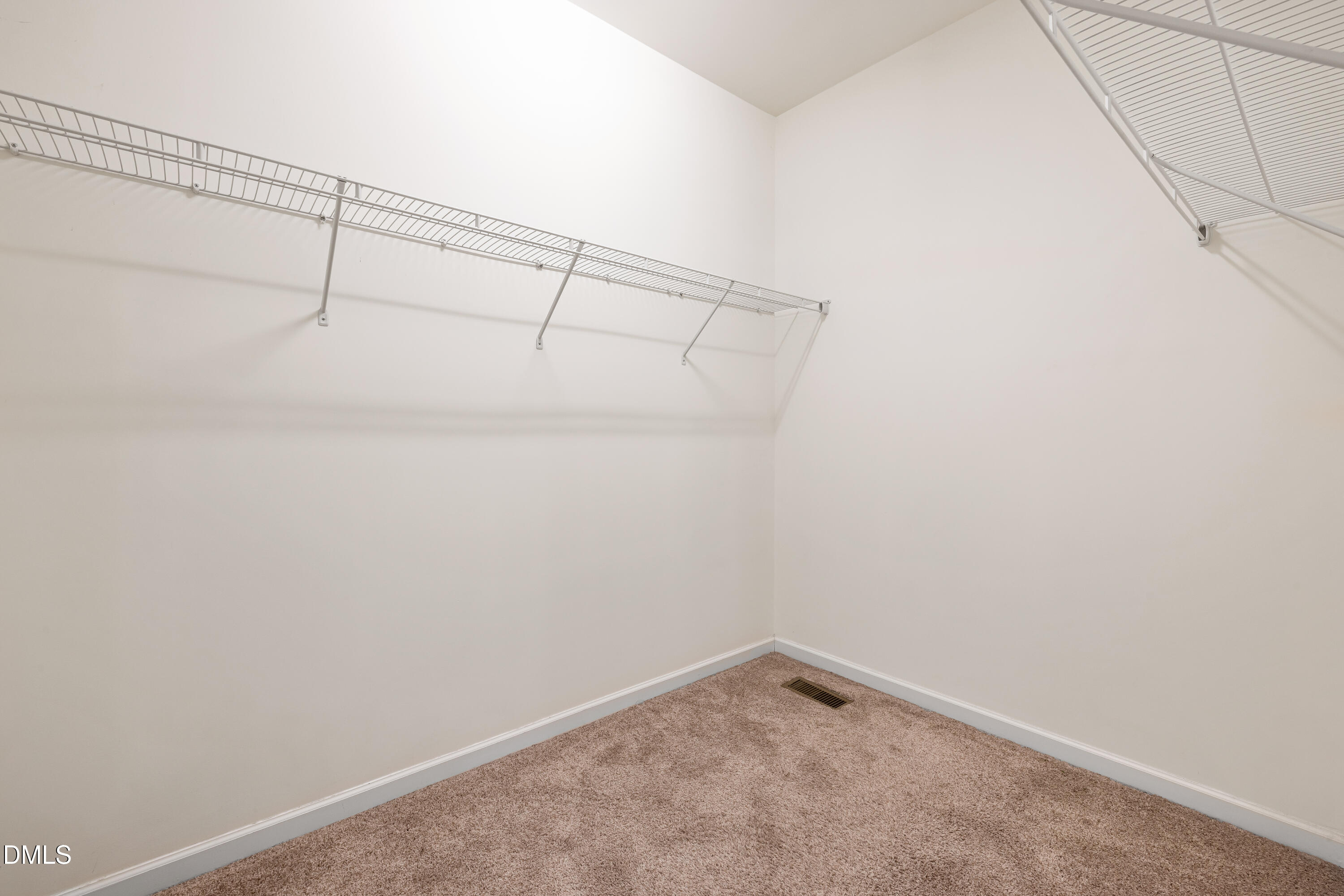 4351 Flintlock Lane Durham, NC 27704 - Photo 24 of 29 a view of a room with racks on the wall