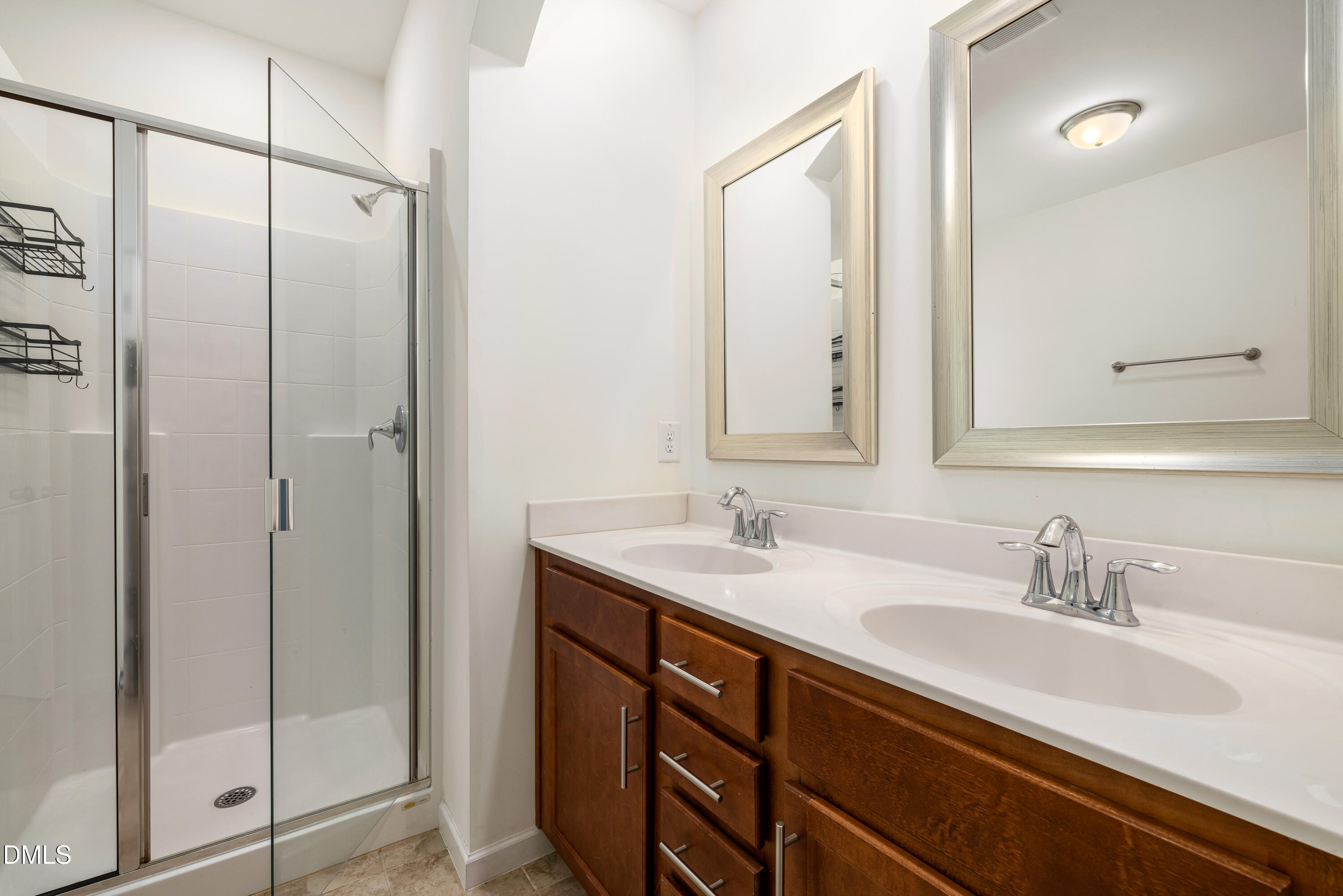 4351 Flintlock Lane Durham, NC 27704 - Photo 27 of 29 a bathroom with a sink and a mirror