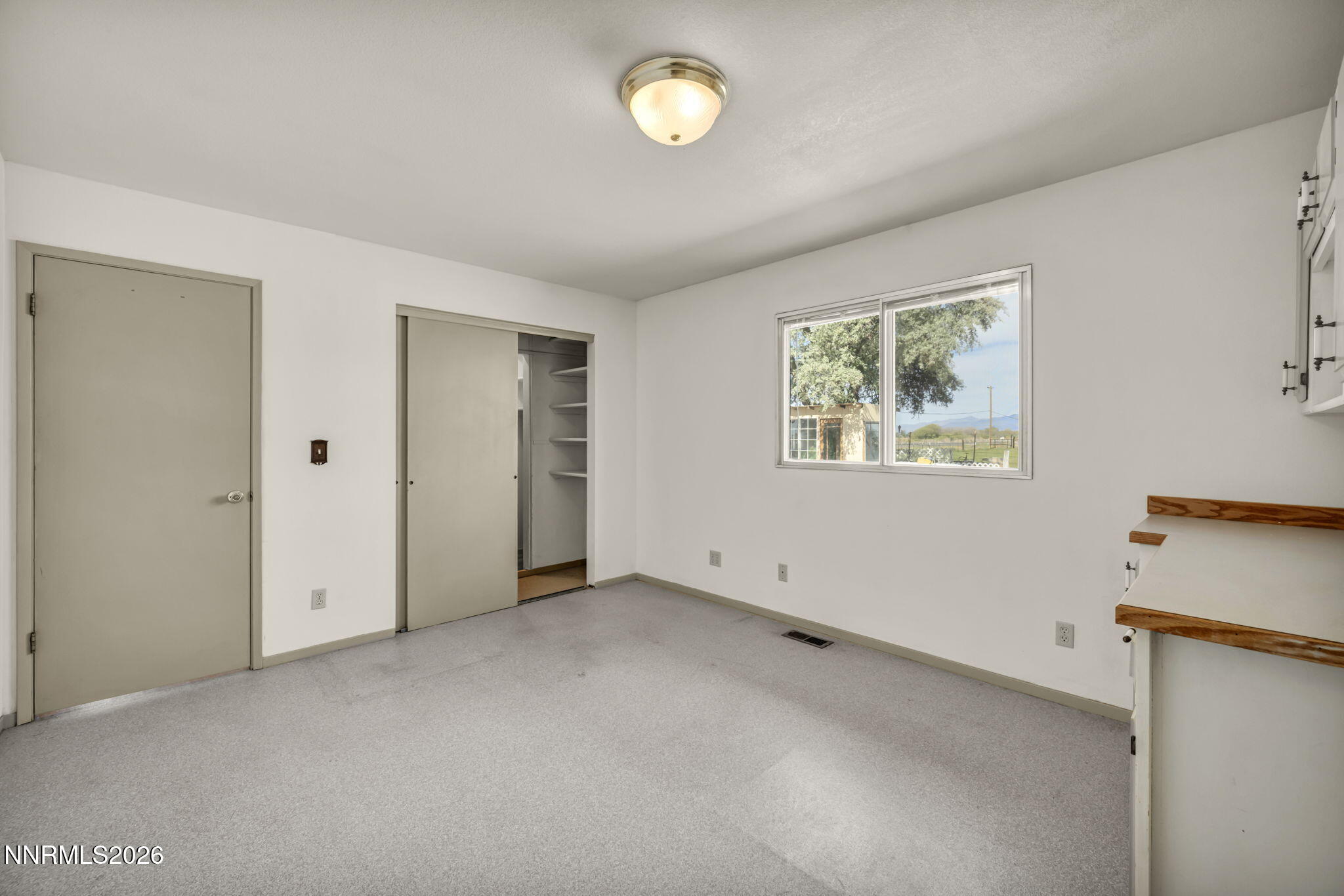 5250 Stillwater Road Fallon, NV 89406 - Photo 18 of 53 a view of an empty room with a window