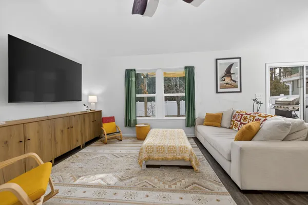 a view of entryway with wooden floor