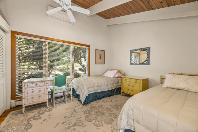 a backyard of a house with seating space