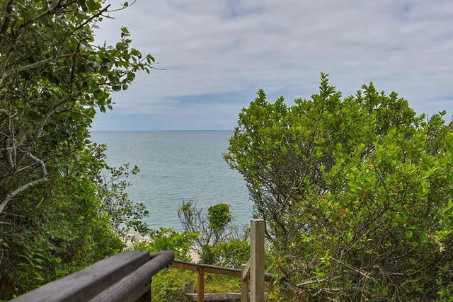 a view of a lake from a balcony