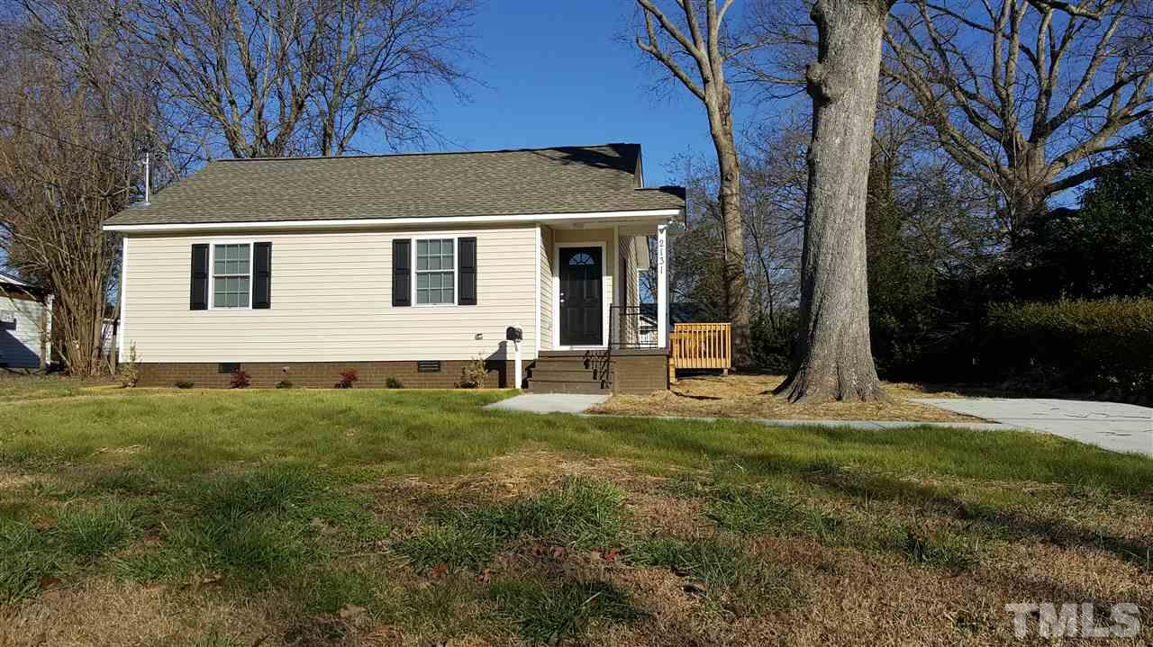2131 Milburnie Road Raleigh, NC 27610 - Photo 1 of 4 a view of a house with backyard