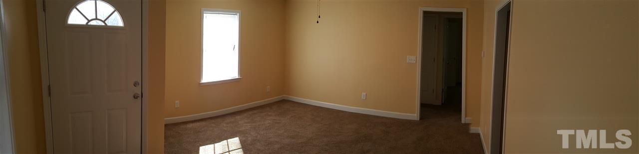 2131 Milburnie Road Raleigh, NC 27610 - Photo 2 of 4 a view of an empty room and window