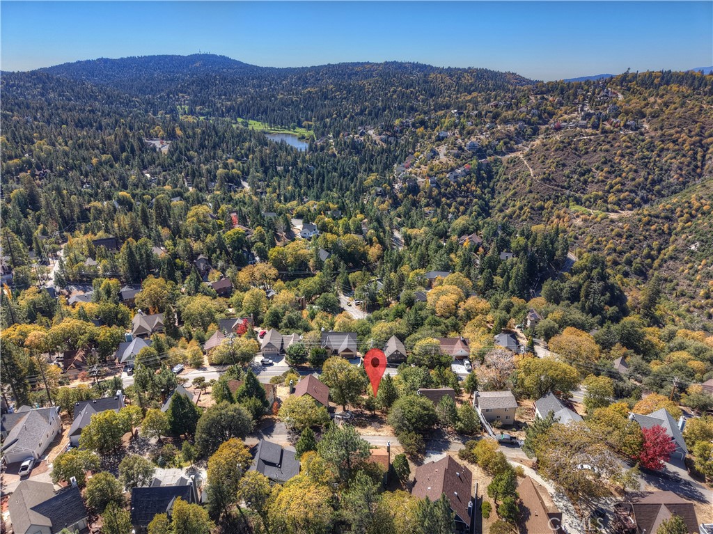 139 Grass Valley Road Lake Arrowhead, CA 92352 - Photo 15 of 18 an aerial view of house with yard and mountain view in back