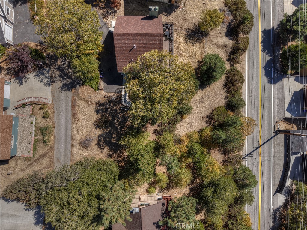 139 Grass Valley Road Lake Arrowhead, CA 92352 - Photo 6 of 18 an aerial view of a house with a yard