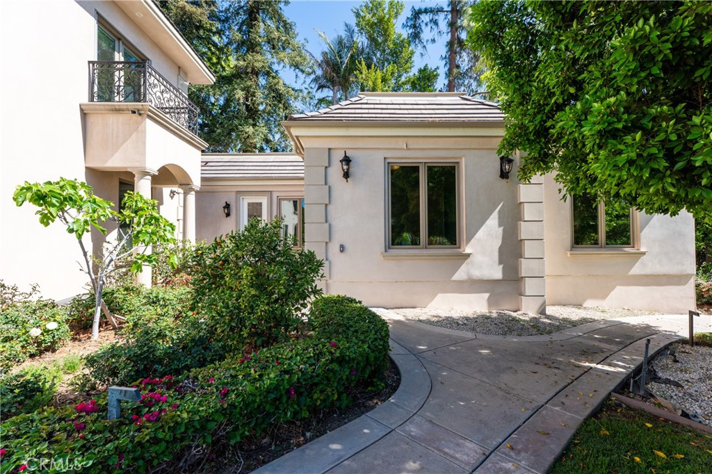 894 Fallen Leaf Road Arcadia, CA 91006 - Photo 1 of 28 a front view of a house with a garden and plants