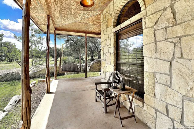 a view of swimming pool with patio