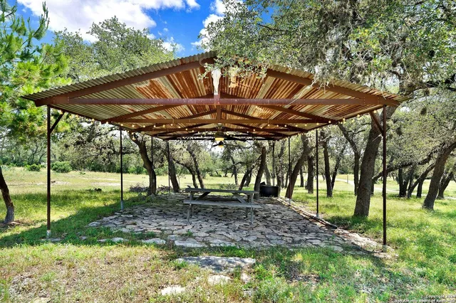 a view of a table and chairs in patio