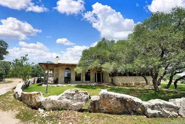 a view of a house with a big yard