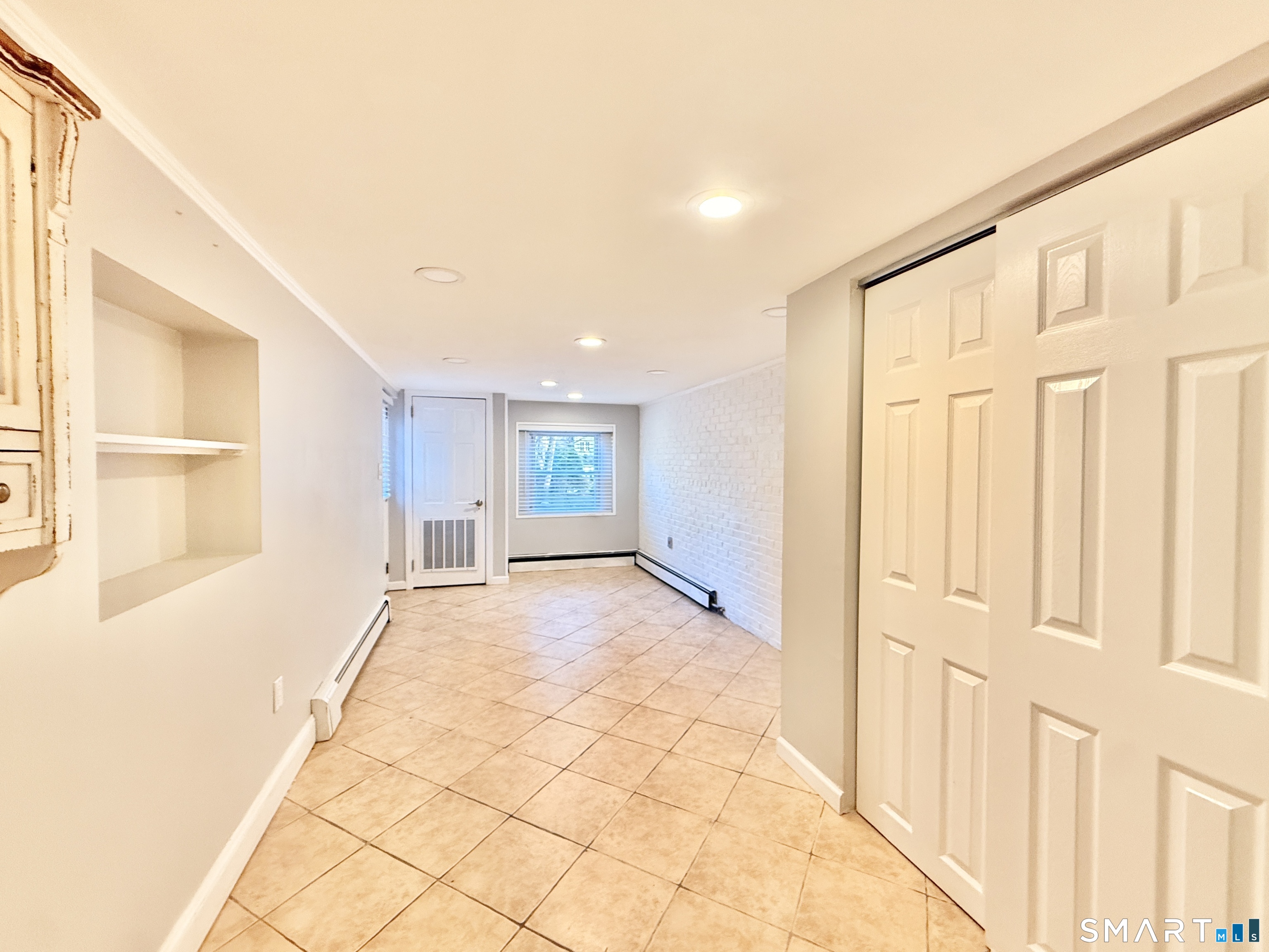 36 Center Drive Greenwich, CT 06870 - Photo 16 of 30 a view of an empty room and window