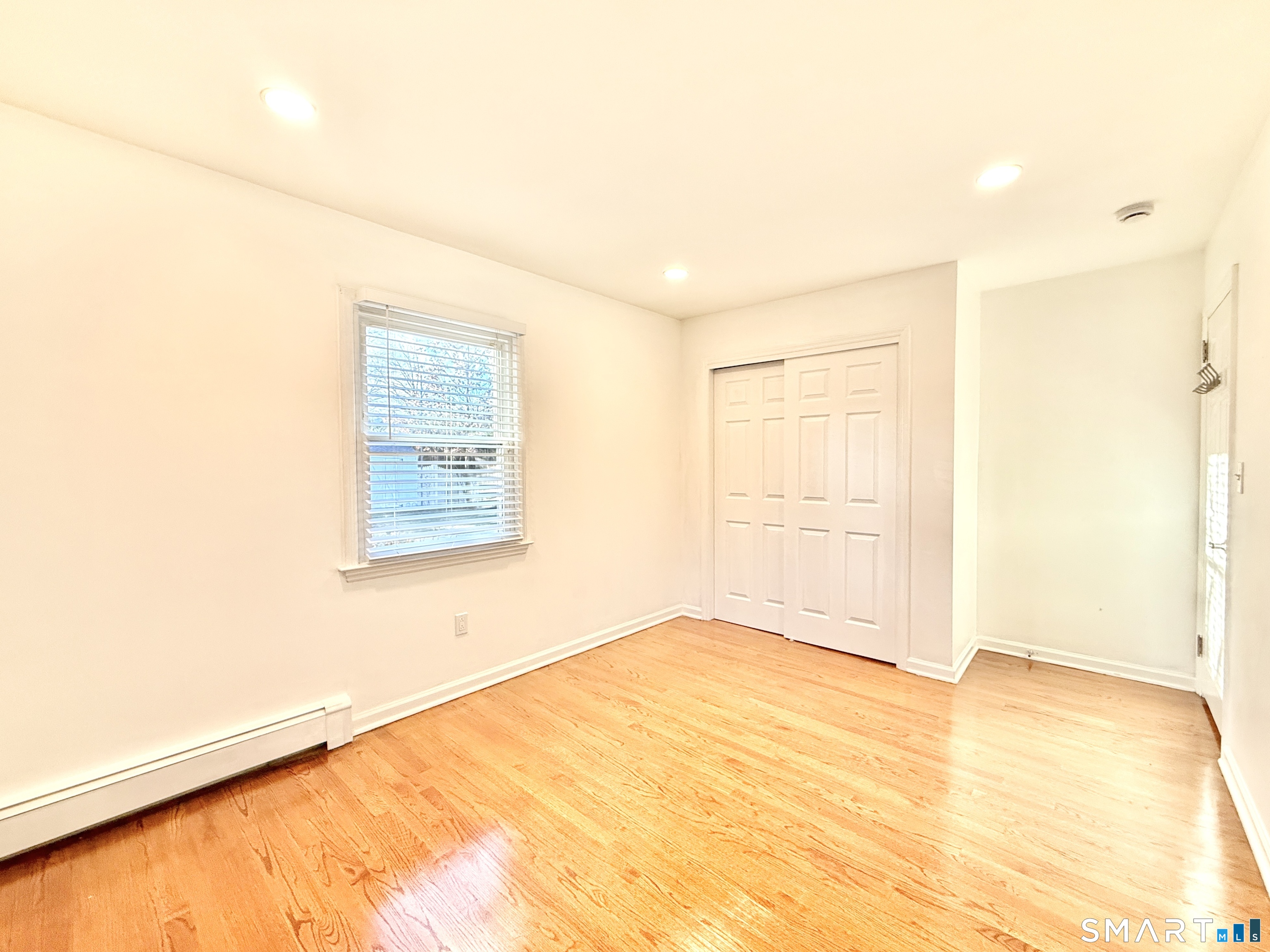 36 Center Drive Greenwich, CT 06870 - Photo 23 of 30 a view of an empty room and window