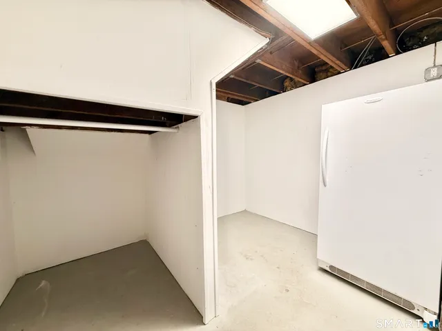 a bathroom with a sink a mirror and a shower