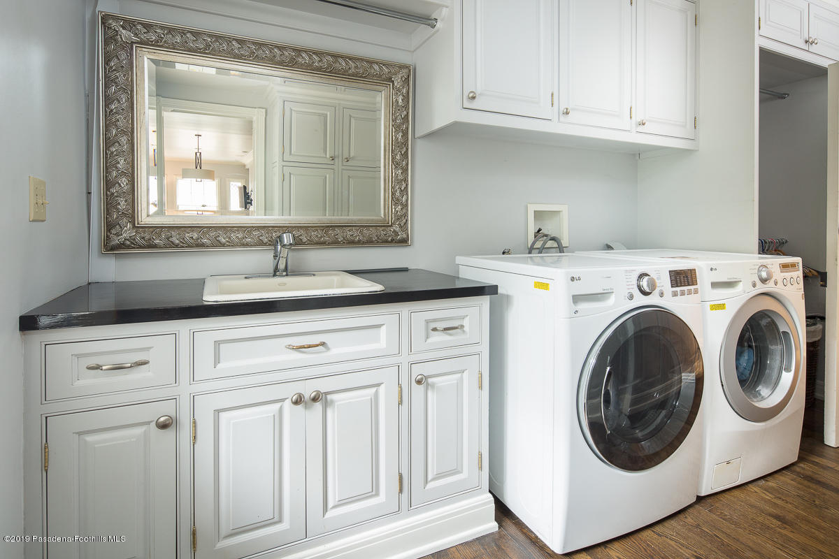 1590 Lombardy Road Pasadena, CA 91106 - Photo 29 of 85 a utility room with dryer and washer