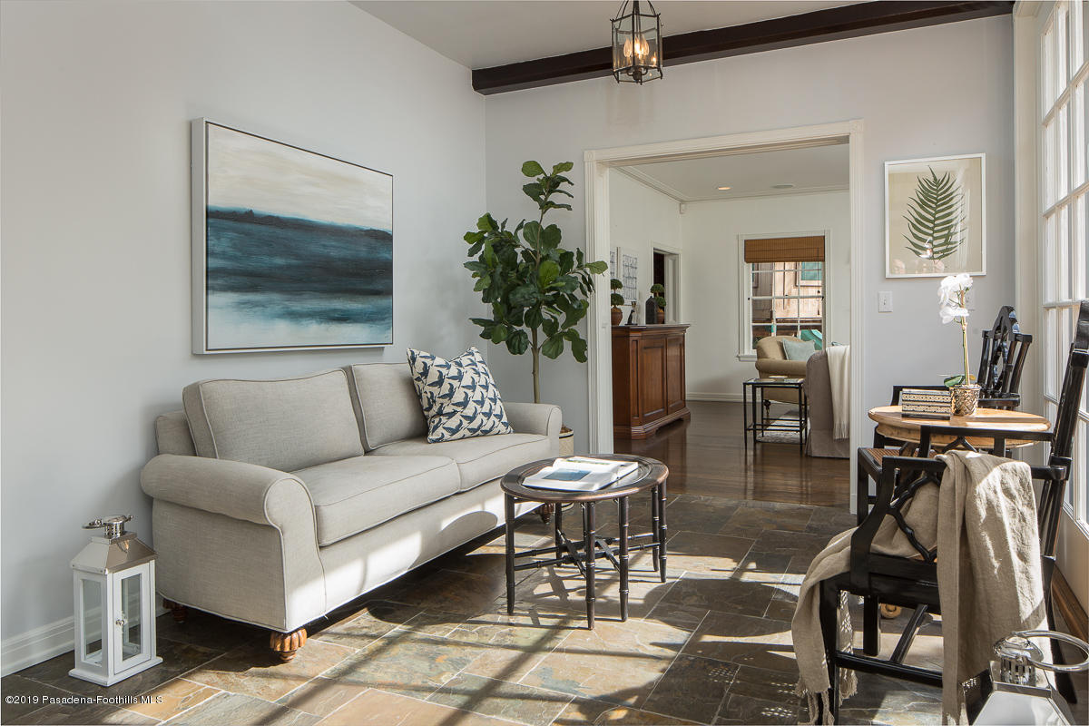 1590 Lombardy Road Pasadena, CA 91106 - Photo 36 of 85 a living room with furniture a dining table and a potted plant