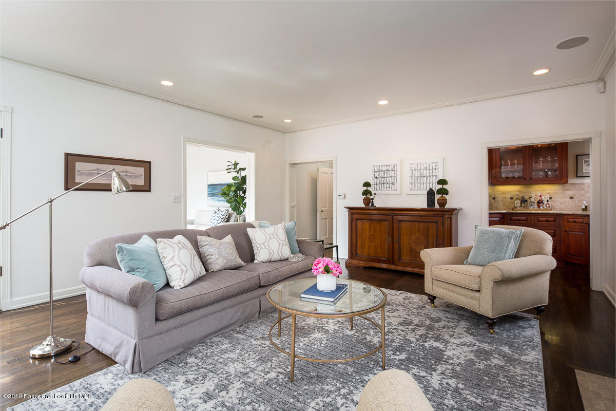 1590 Lombardy Road Pasadena, CA 91106 - Photo 41 of 85 a living room with furniture and a flat screen tv