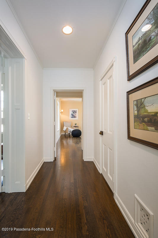 1590 Lombardy Road Pasadena, CA 91106 - Photo 44 of 85 a view of a hallway with wooden floor and closet