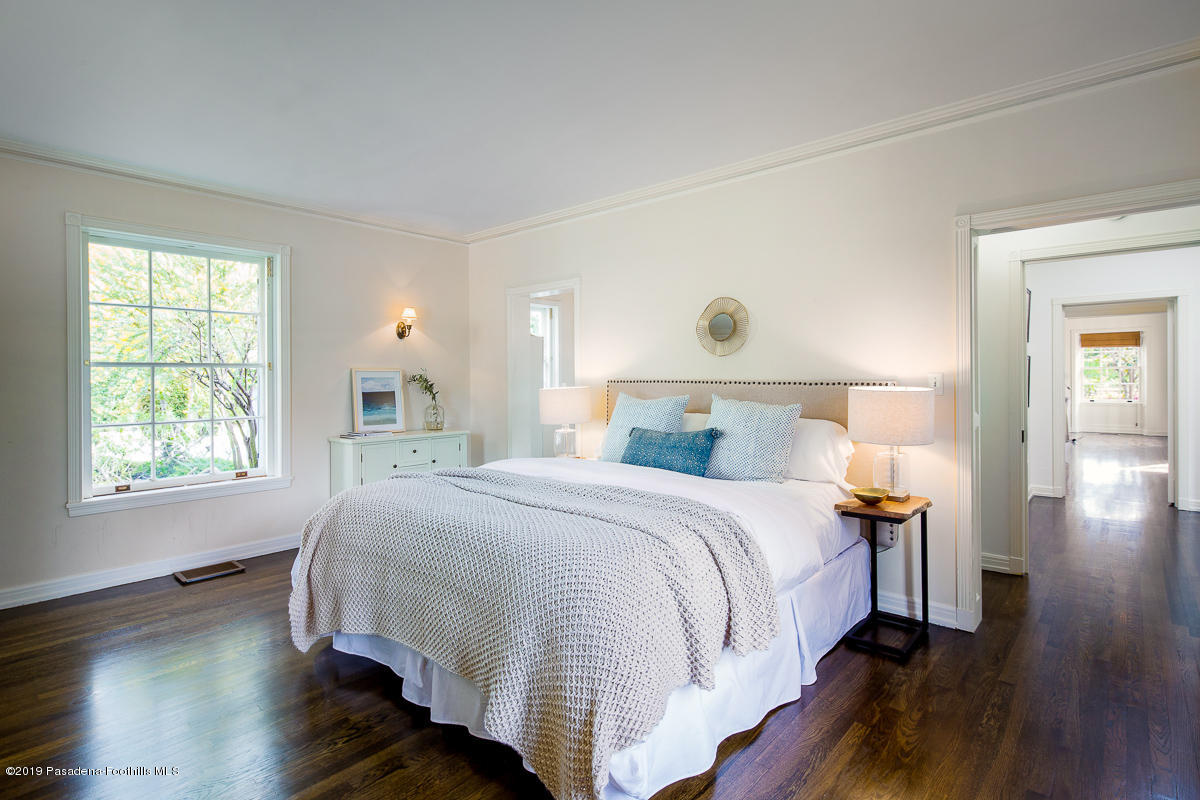1590 Lombardy Road Pasadena, CA 91106 - Photo 45 of 85 a bedroom with a bed and wooden floor