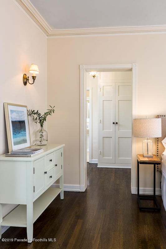 1590 Lombardy Road Pasadena, CA 91106 - Photo 47 of 85 a view of a livingroom with wooden floor and cabinet