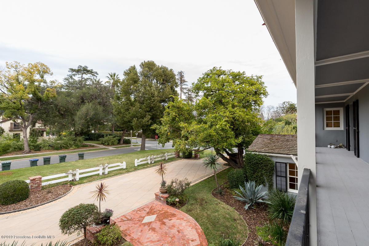 1590 Lombardy Road Pasadena, CA 91106 - Photo 57 of 85 a view of a swimming pool with a patio