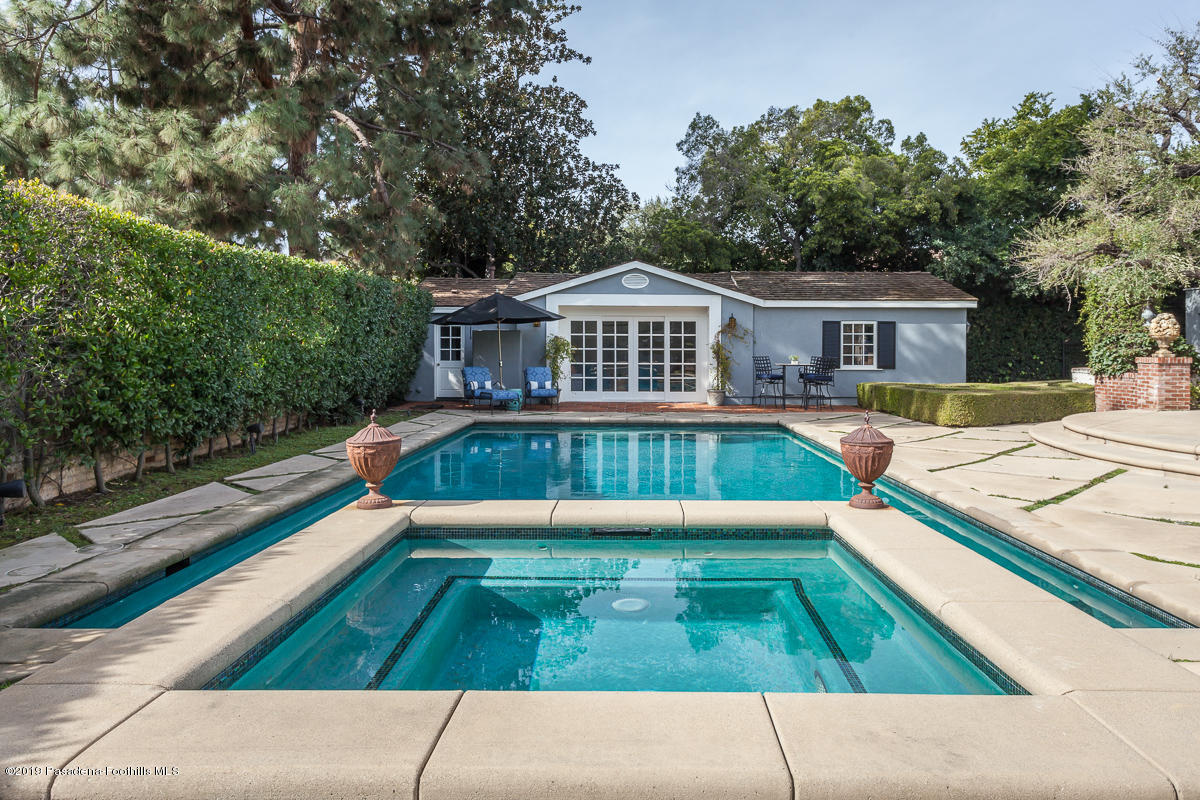 1590 Lombardy Road Pasadena, CA 91106 - Photo 77 of 85 a view of backyard with swimming pool and seating space