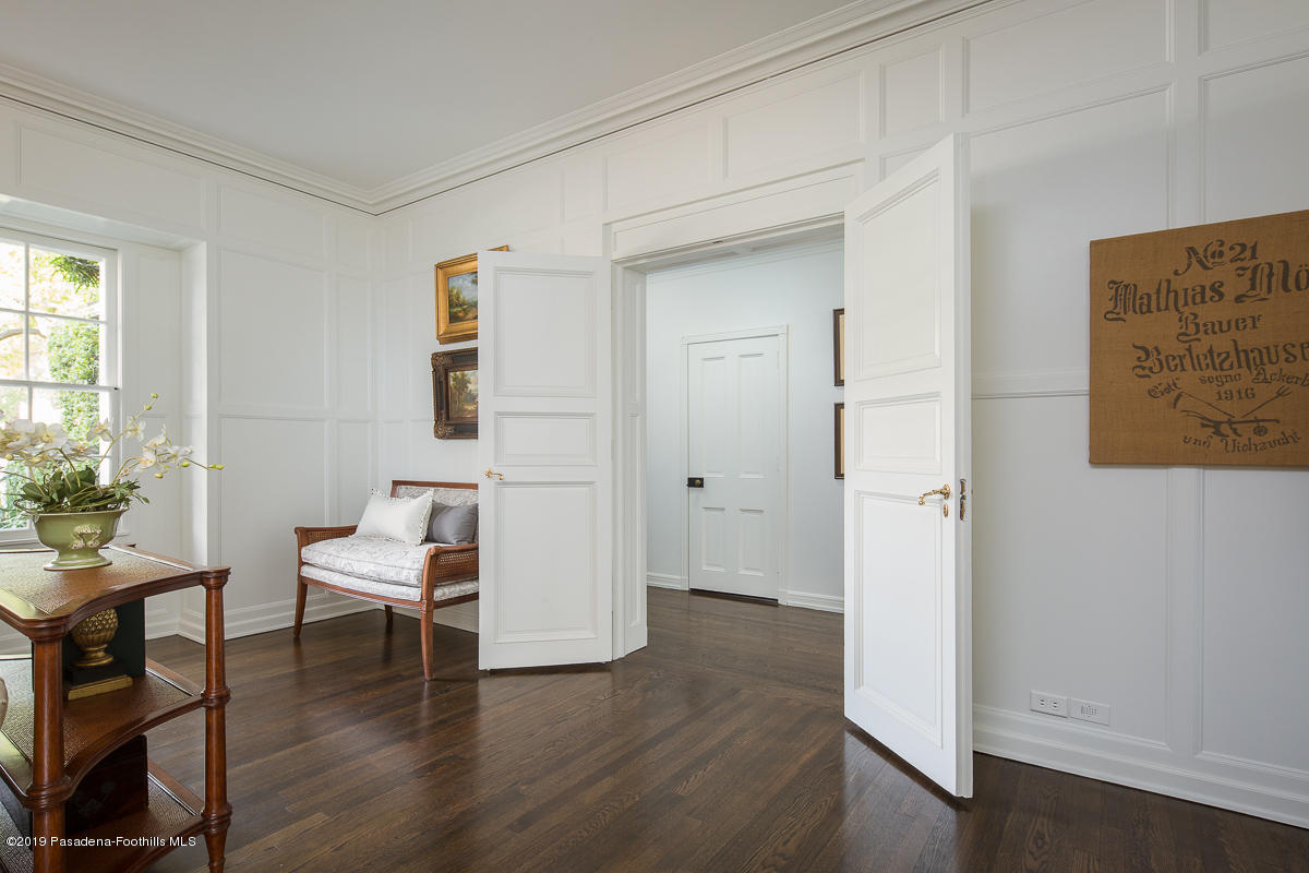 1590 Lombardy Road Pasadena, CA 91106 - Photo 10 of 85 a view of a room with wooden floor furniture and windows