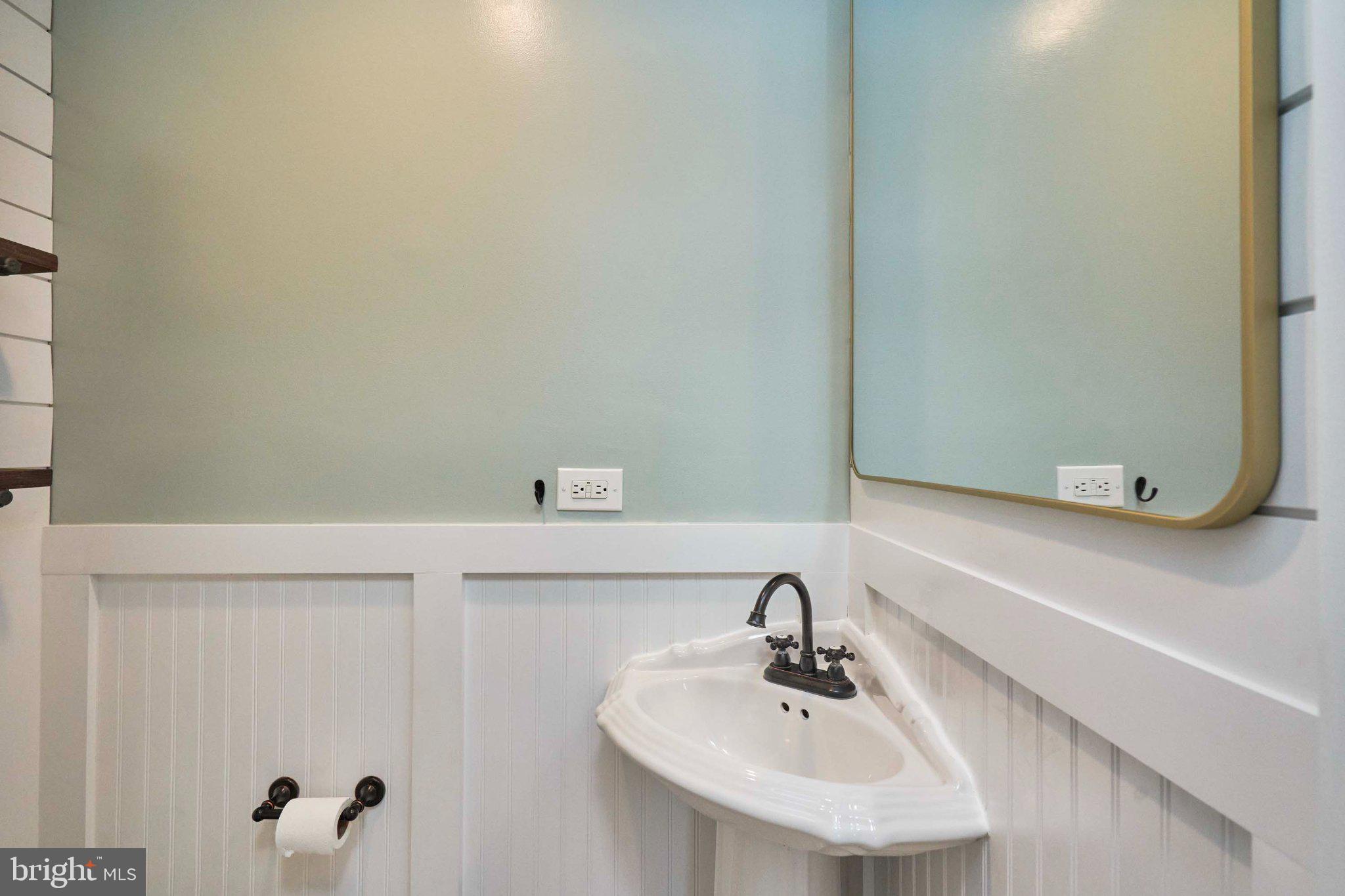 3270 Fox Mill Road Oakton, VA 22124 - Photo 41 of 66 Charming half-bath with modern flair.