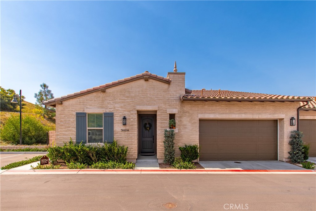 5024 Rexton Drive Camarillo, CA 93012 - Photo 2 of 48 front view of a house and a yard
