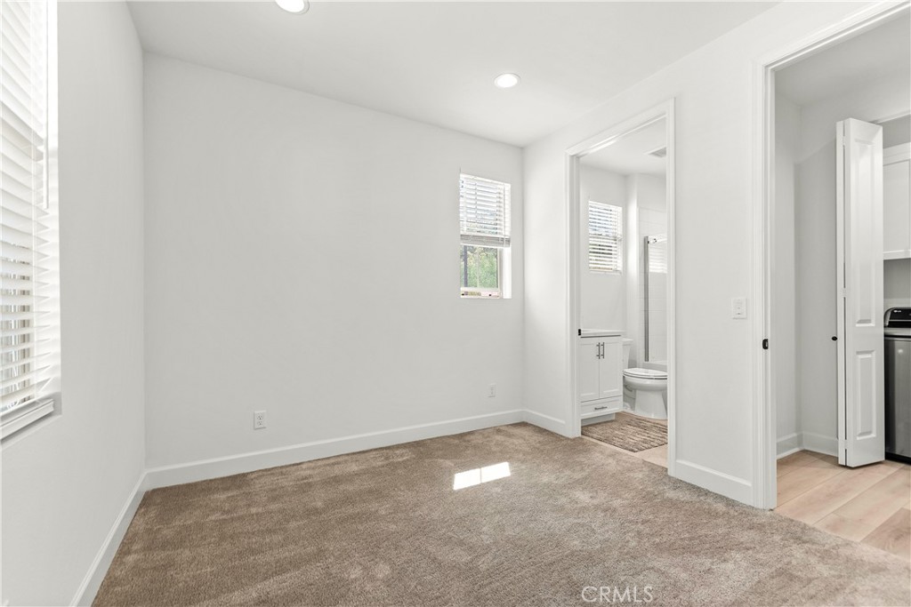 5024 Rexton Drive Camarillo, CA 93012 - Photo 21 of 48 an empty room with windows and closet