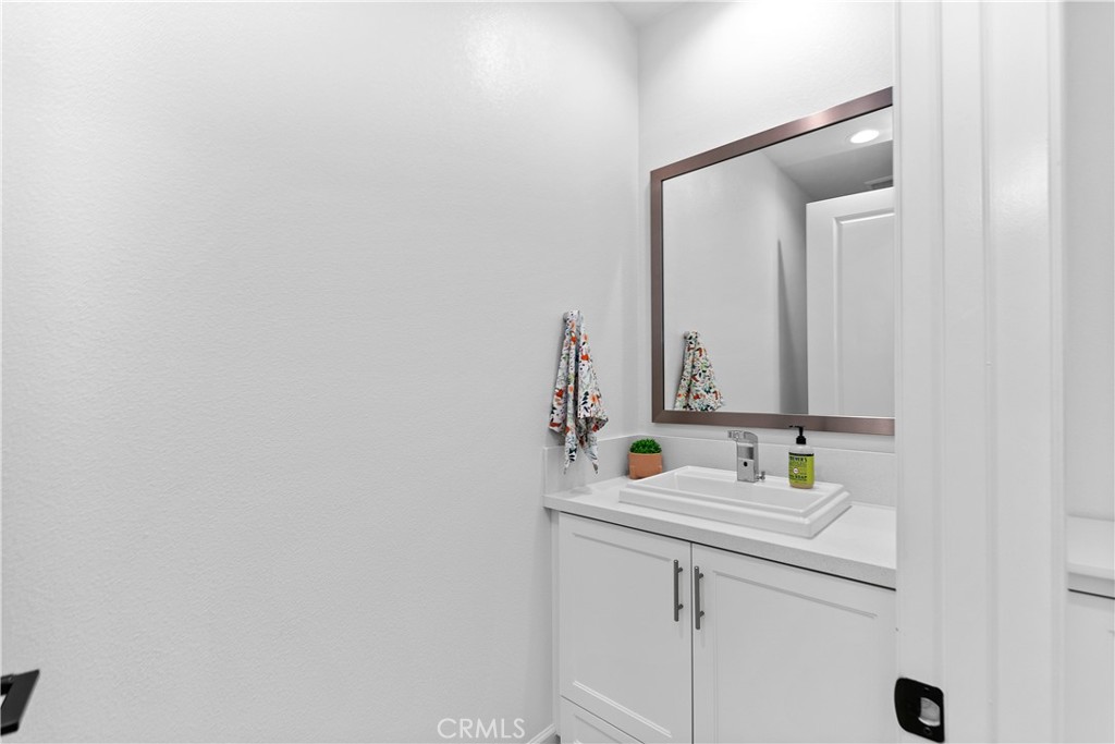 5024 Rexton Drive Camarillo, CA 93012 - Photo 25 of 48 a bathroom with a sink and a mirror