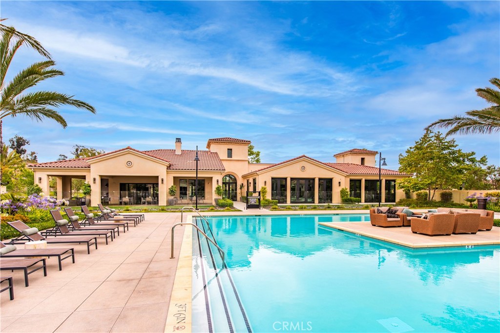 5024 Rexton Drive Camarillo, CA 93012 - Photo 40 of 48 a front view of a house with swimming pool having outdoor seating