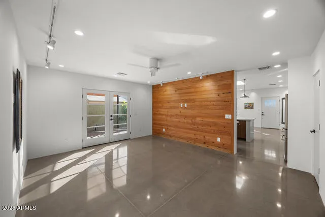 a view of an empty room with a fireplace