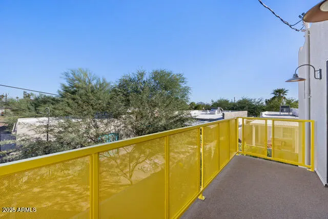 a view of a swimming pool with a chairs