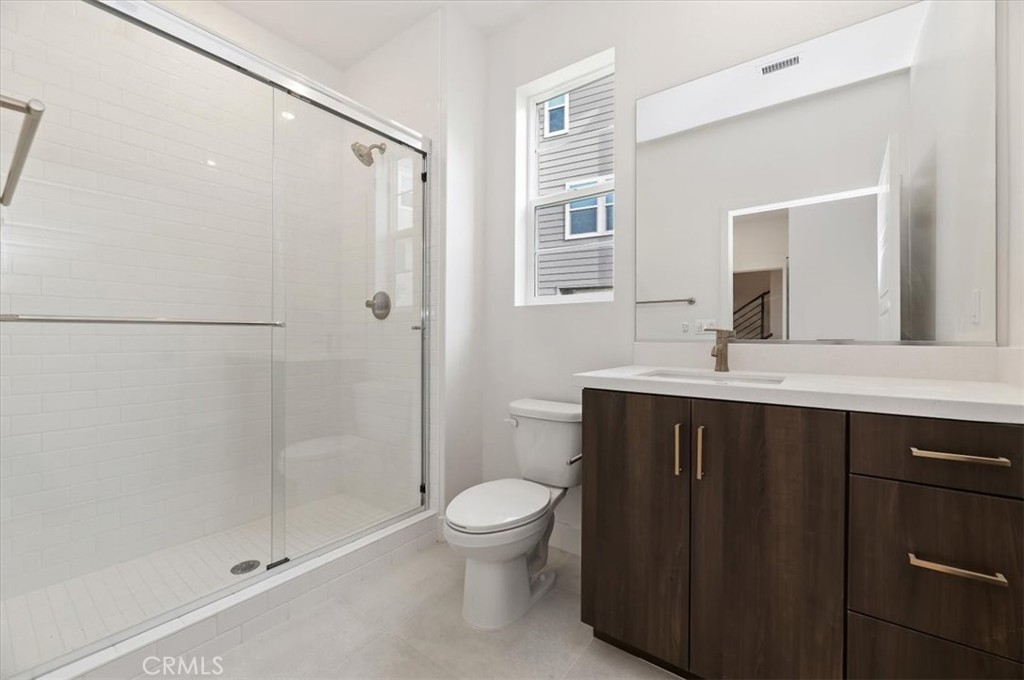 31680 Williams Way Rancho Mission Viejo, CA 92694 - Photo 4 of 35 a bathroom with a double vanity sink toilet and shower