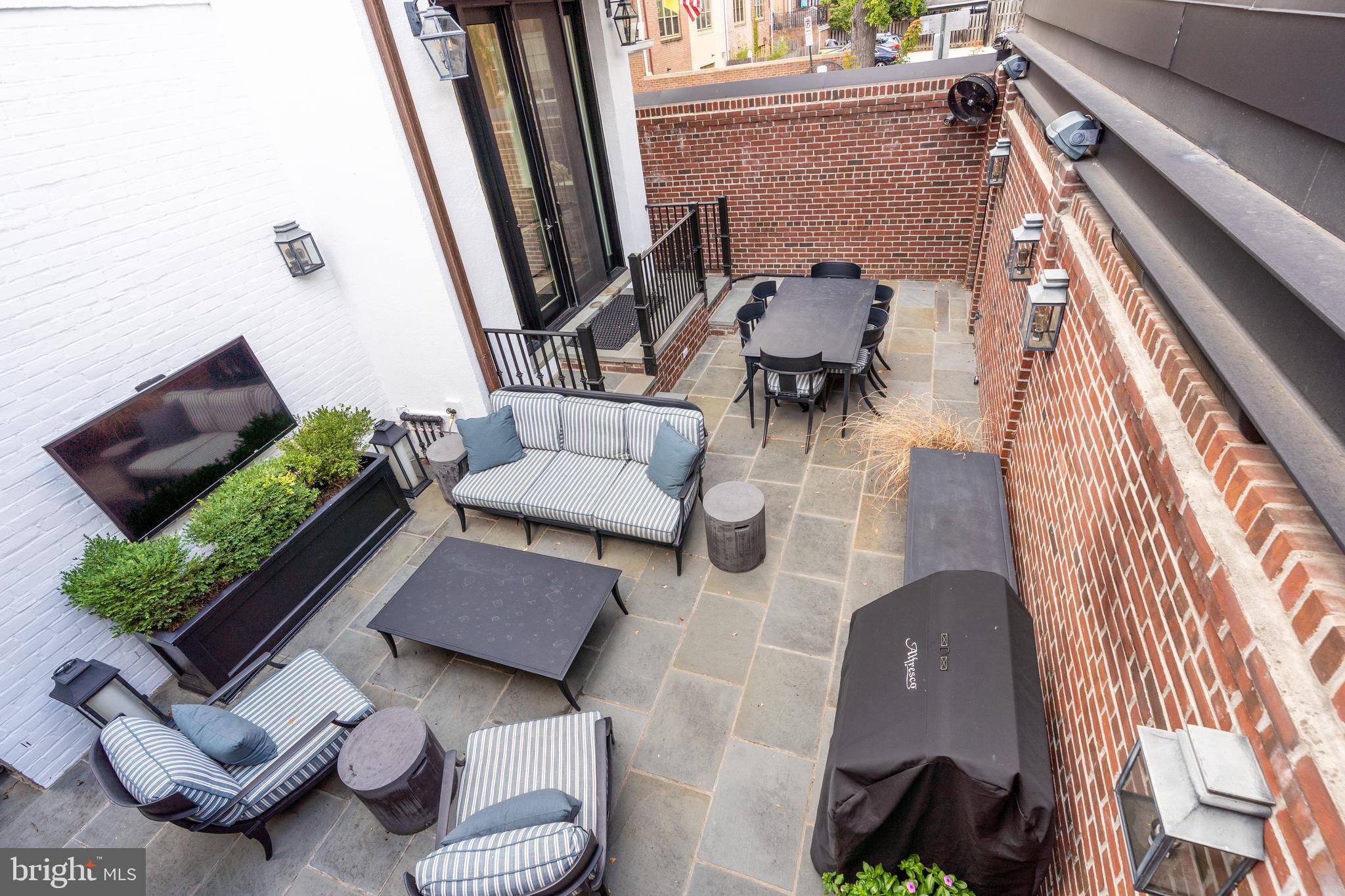 1619 19th Street Northwest Washington, DC 20009 - Photo 19 of 50 a view of living room filled with furniture and a couch