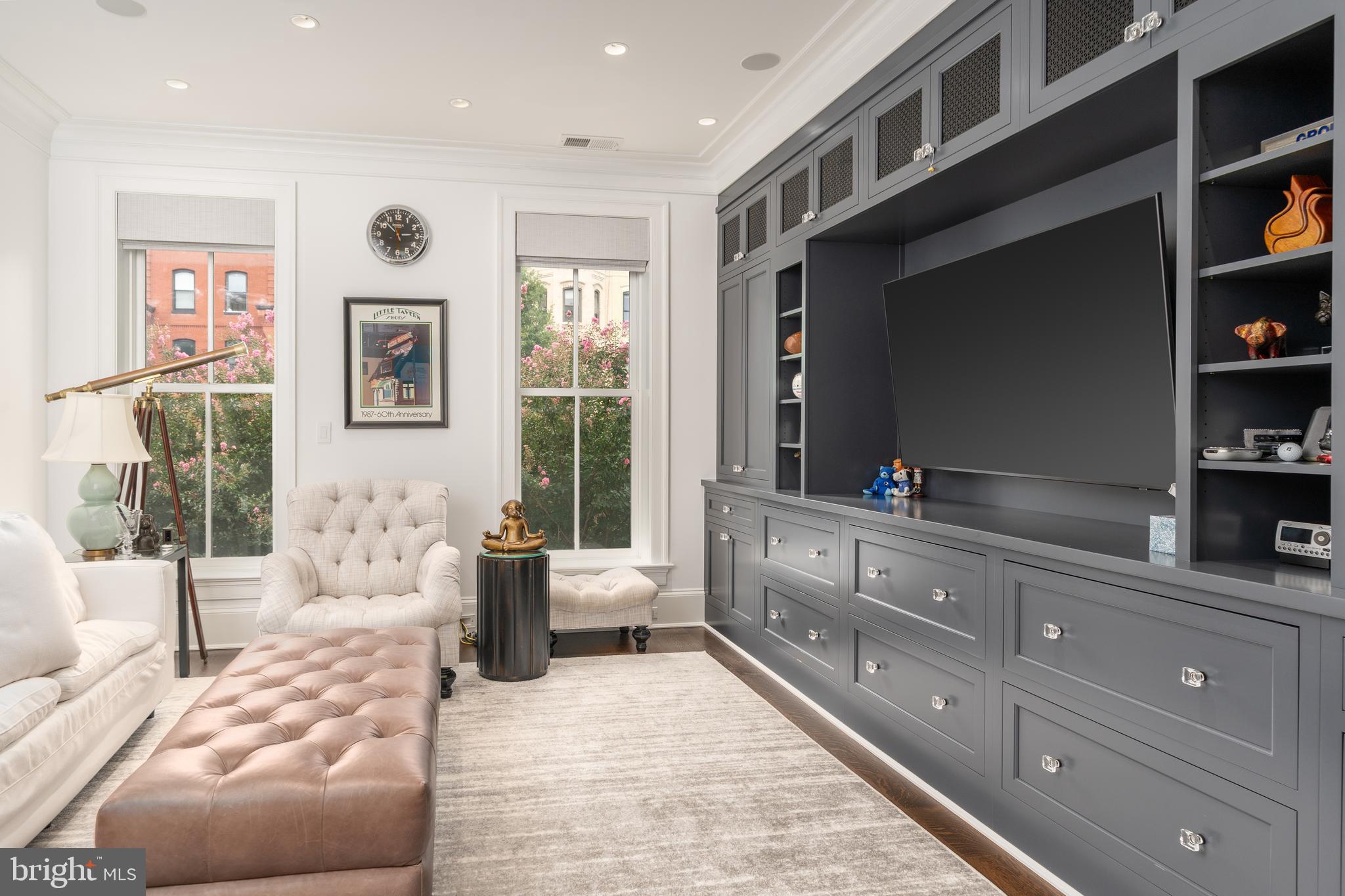 1619 19th Street Northwest Washington, DC 20009 - Photo 24 of 50 a large bedroom with a large bed and furniture