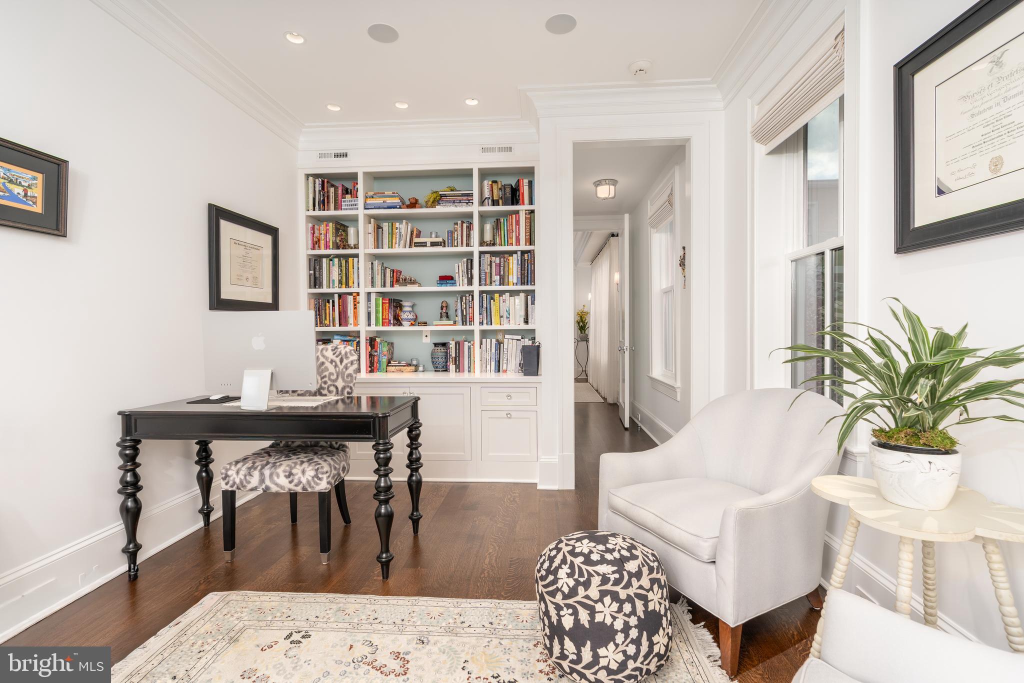 1619 19th Street Northwest Washington, DC 20009 - Photo 28 of 50 a living room with furniture potted plant and a table