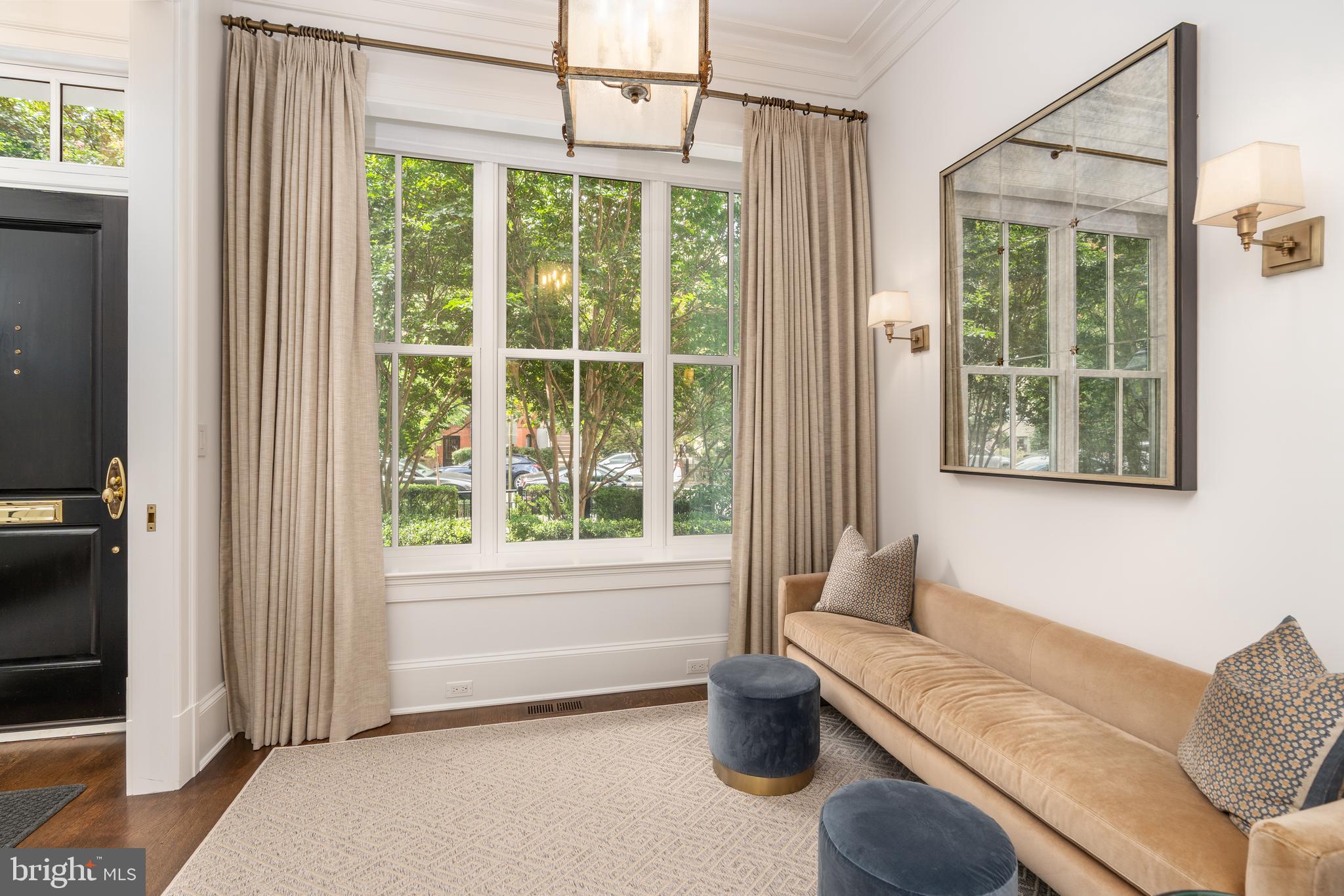 1619 19th Street Northwest Washington, DC 20009 - Photo 3 of 50 a living room with furniture and a window