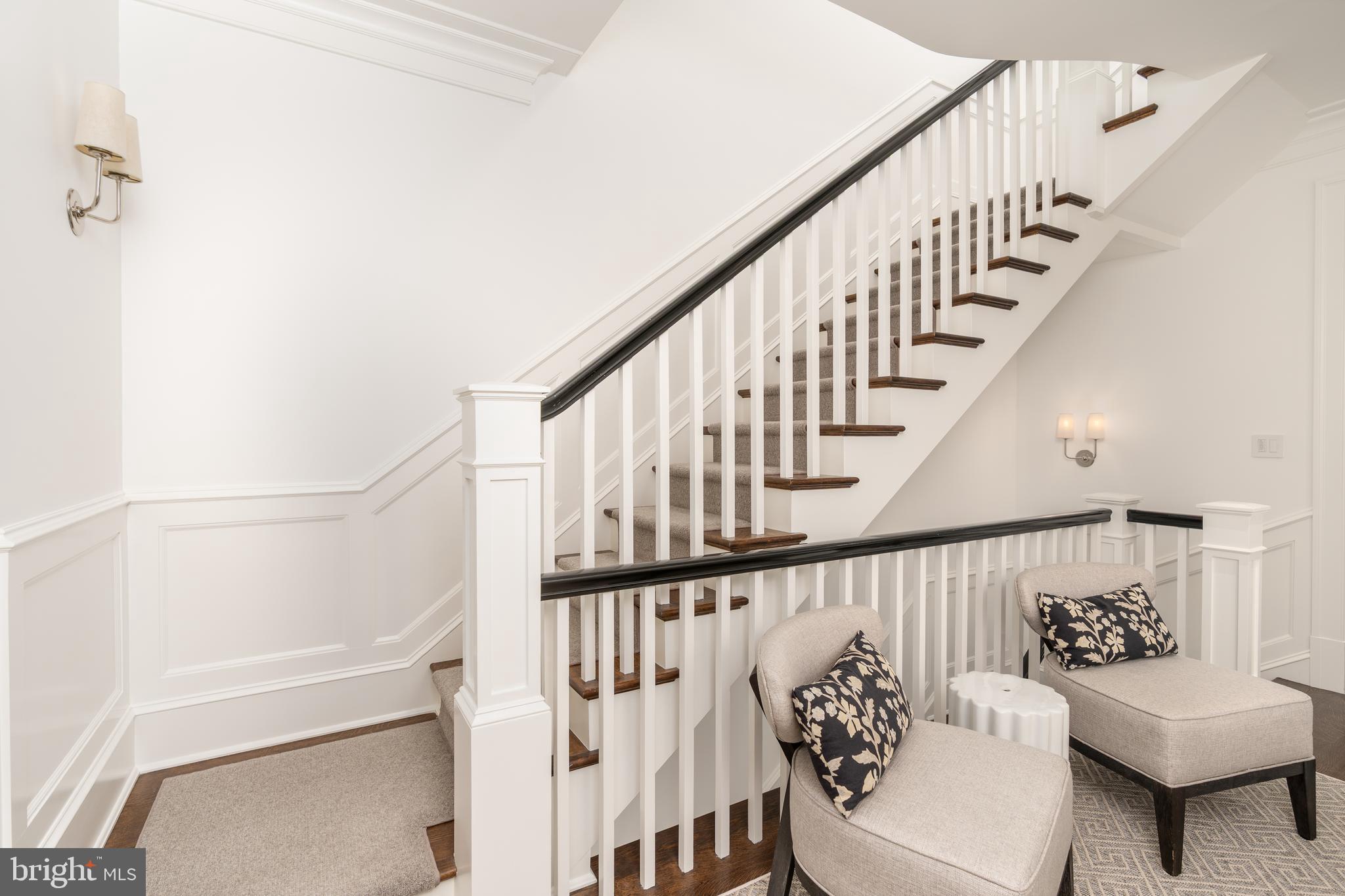 1619 19th Street Northwest Washington, DC 20009 - Photo 33 of 50 a view of entryway with wooden floor and stairs