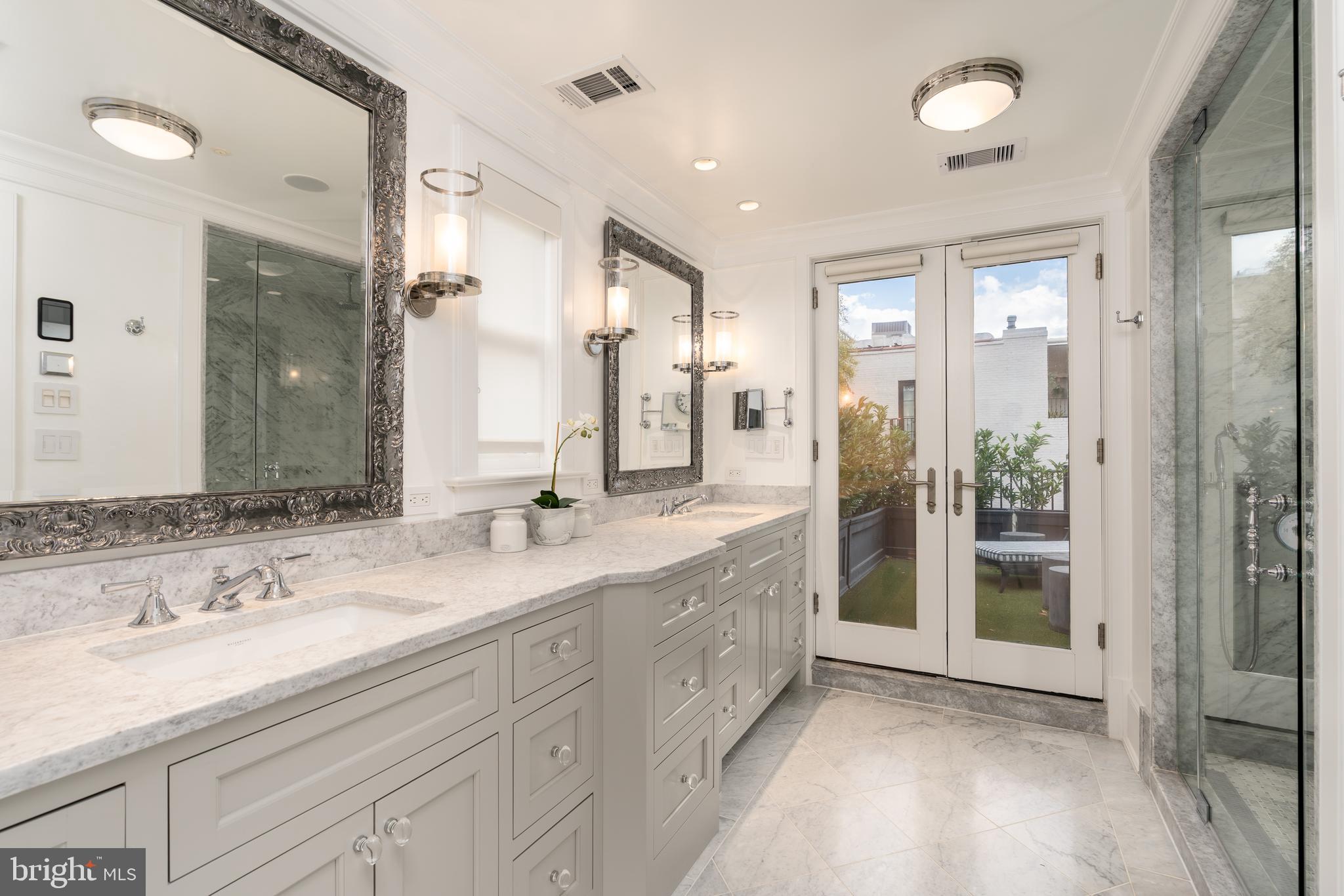 1619 19th Street Northwest Washington, DC 20009 - Photo 37 of 50 a spacious bathroom with a double vanity sink mirror and double