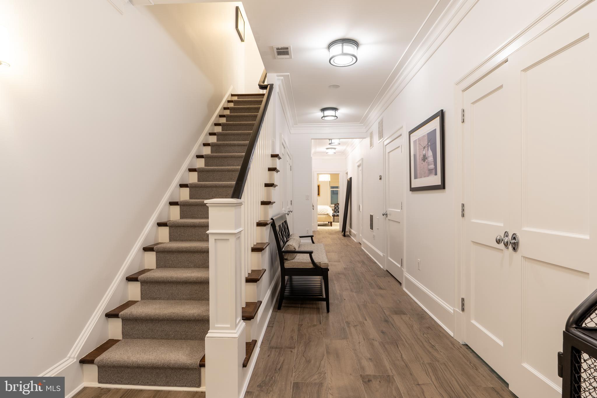 1619 19th Street Northwest Washington, DC 20009 - Photo 43 of 50 a view of entryway and hall with wooden floor