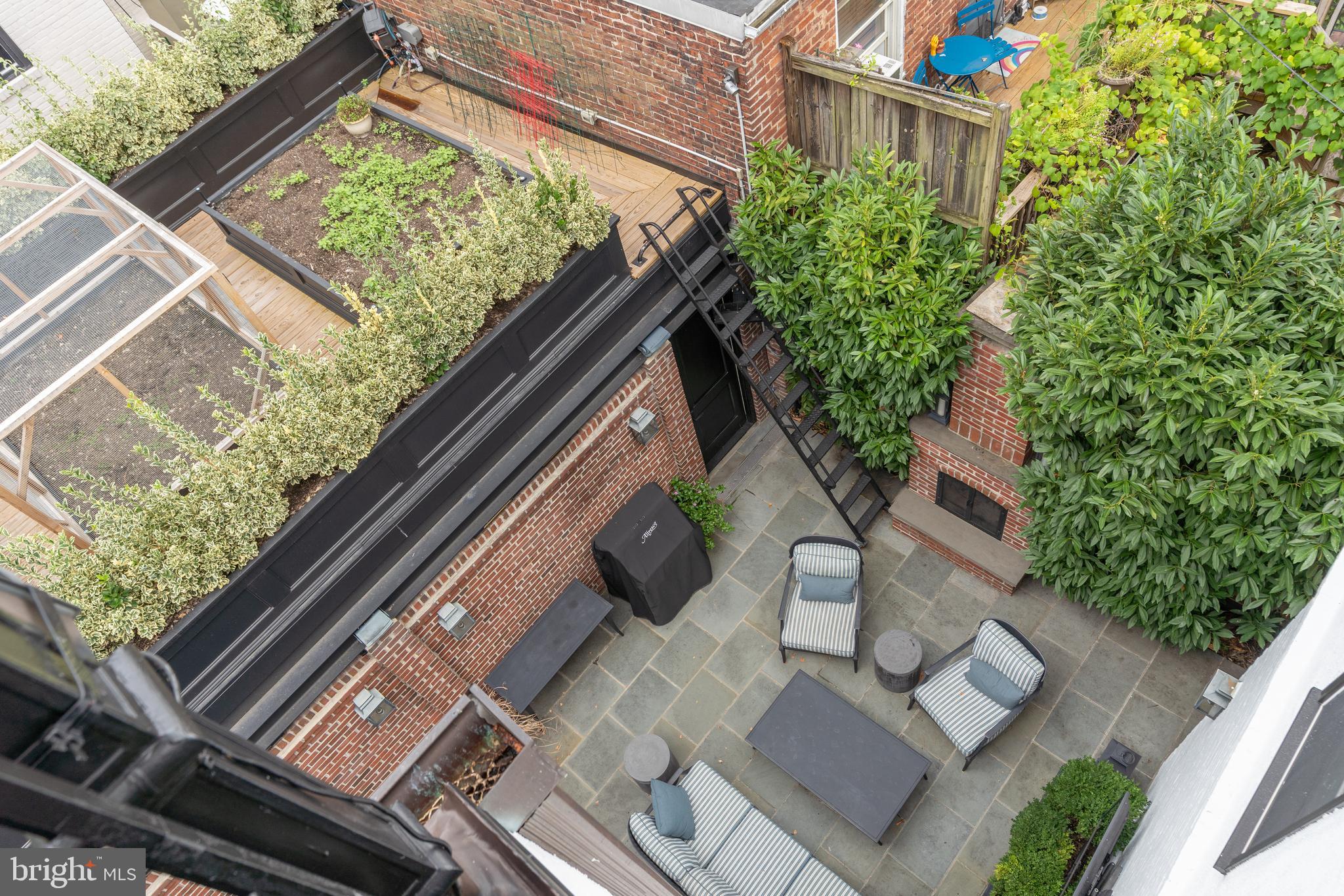 1619 19th Street Northwest Washington, DC 20009 - Photo 47 of 50 a view of a backyard with sitting area