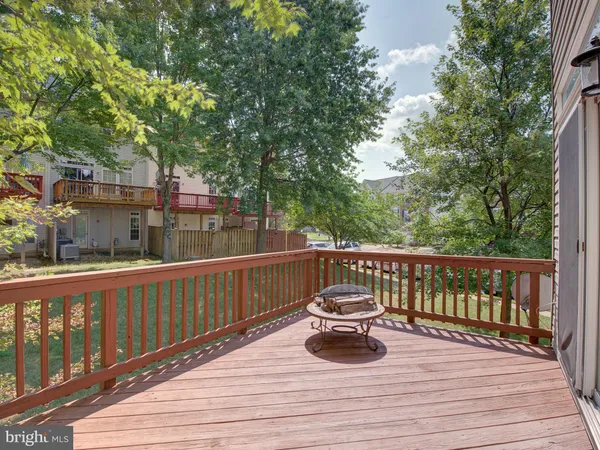 a view of balcony with furniture
