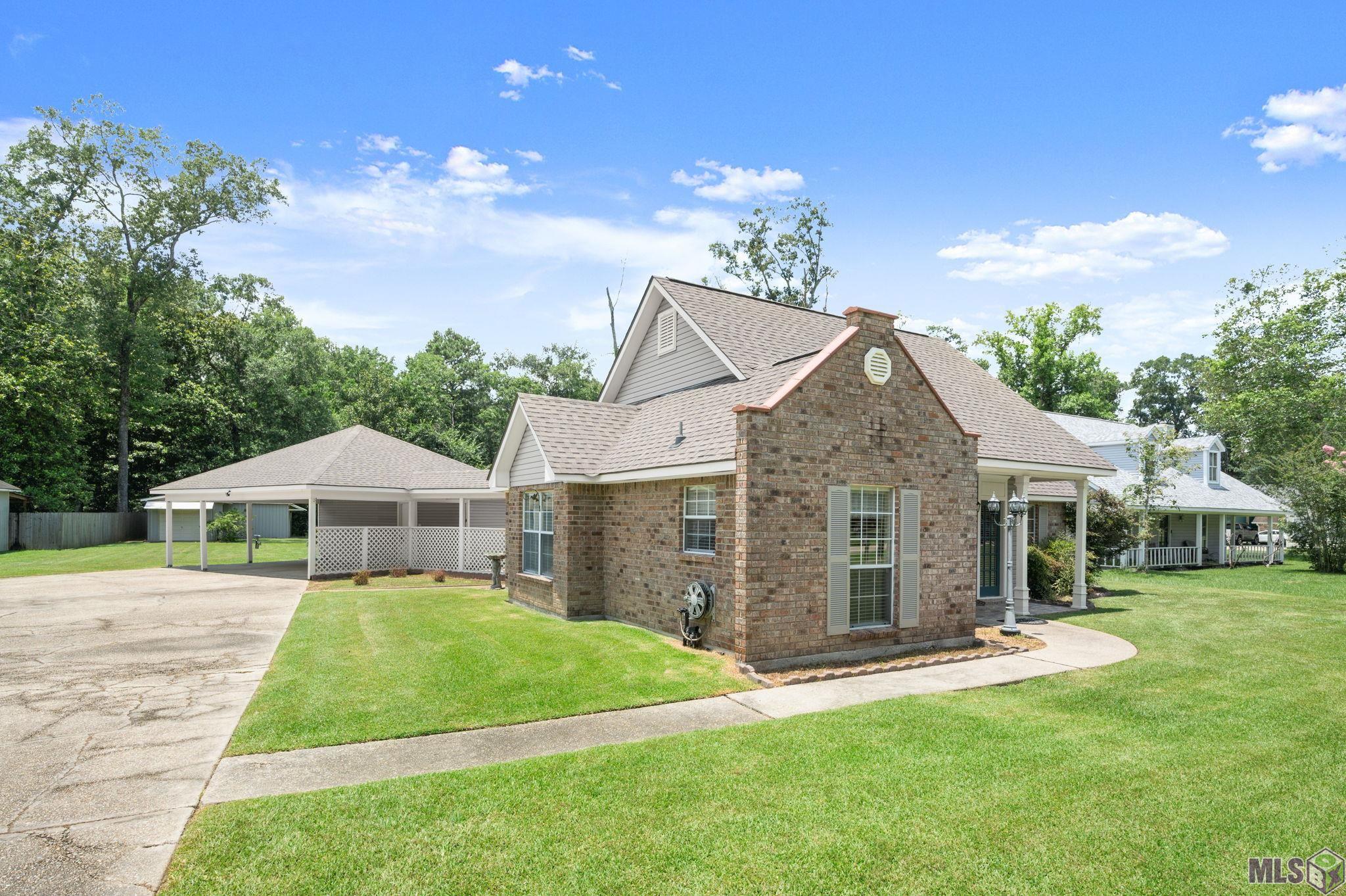 7097 Jim Rushing Road Denham Springs, LA 70706 - Photo 24 of 28 Front/side view with tons of parking space
