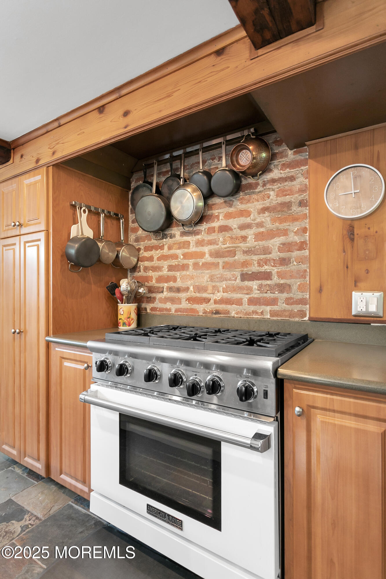 263 Cooper Road Red Bank, NJ 07701 - Photo 12 of 42 a stove top oven sitting inside of a kitchen