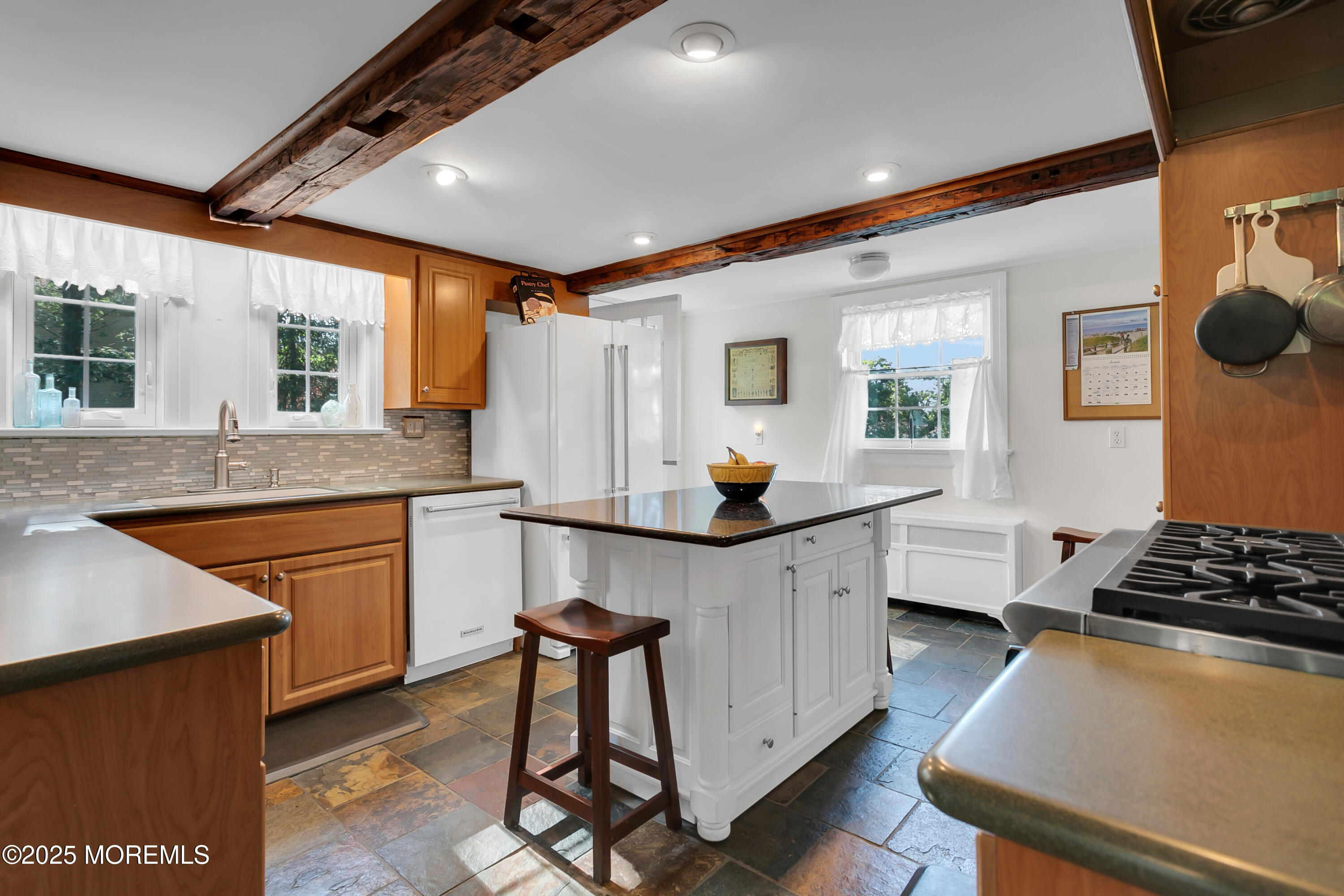 263 Cooper Road Red Bank, NJ 07701 - Photo 2 of 42 a kitchen with a sink appliances and cabinets