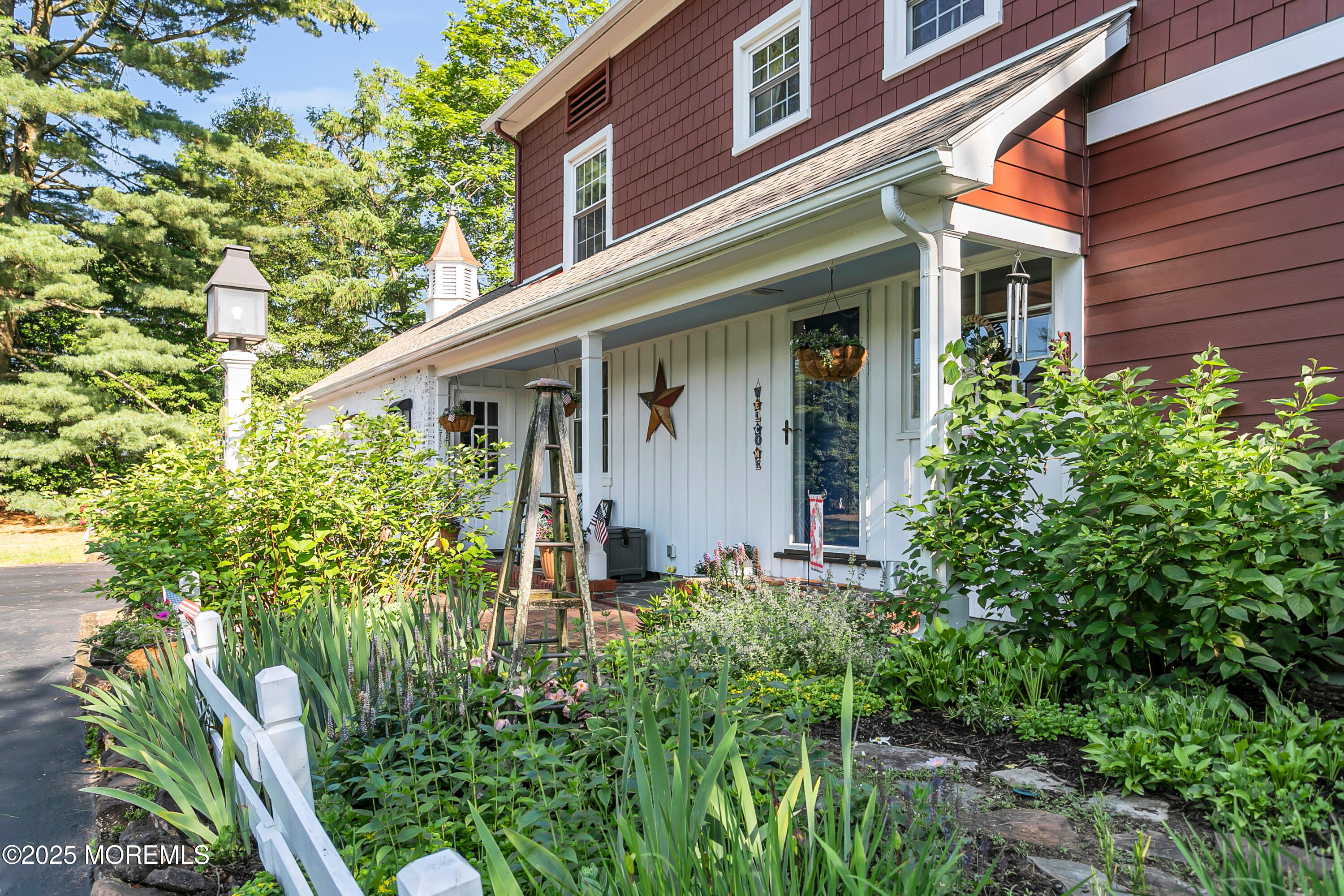 263 Cooper Road Red Bank, NJ 07701 - Photo 25 of 42 front view of a house with a small yard