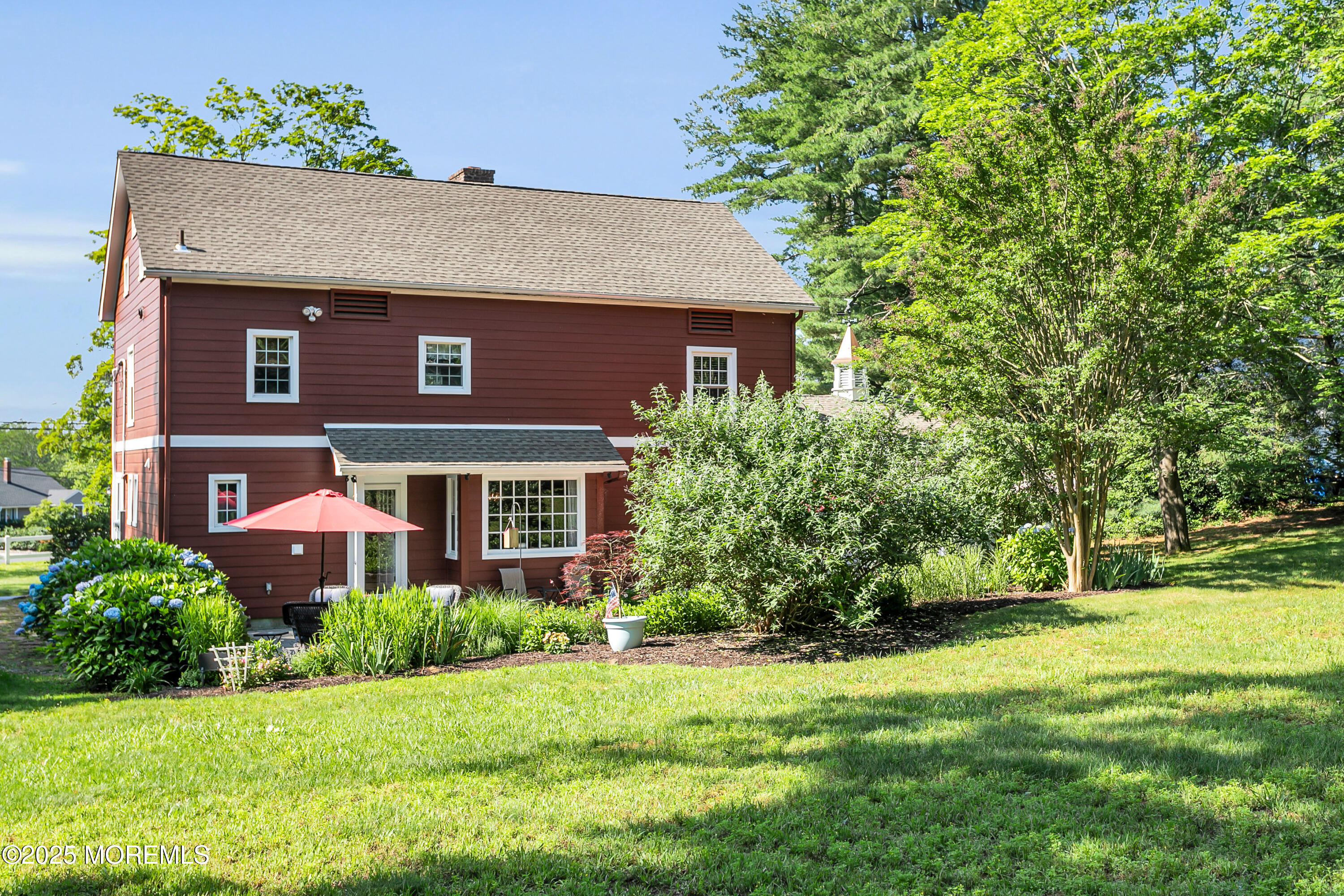 263 Cooper Road Red Bank, NJ 07701 - Photo 33 of 42 a front view of house with yard and green space