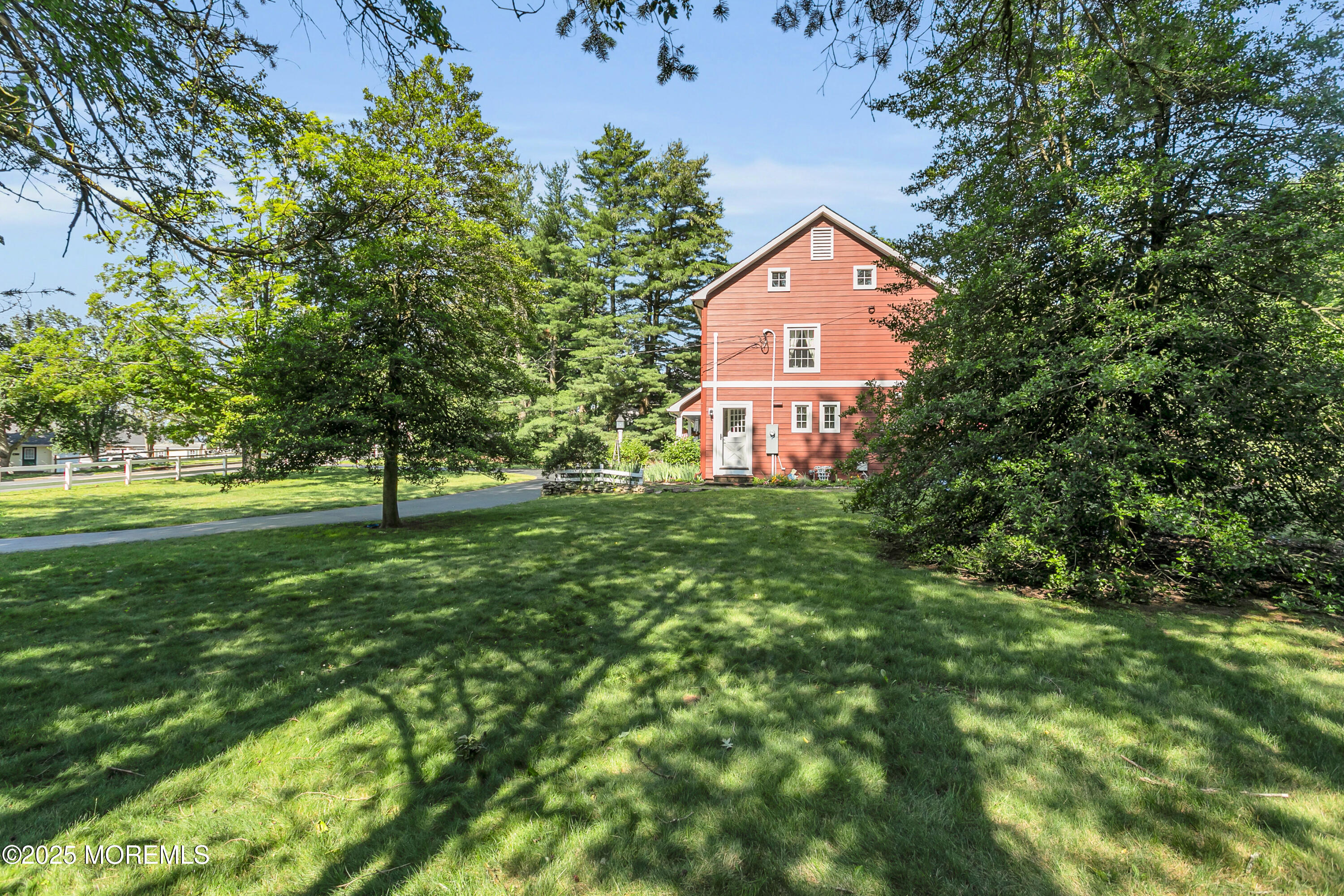 263 Cooper Road Red Bank, NJ 07701 - Photo 34 of 42 a view of a house with a tree park